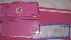 A pencil box with white board