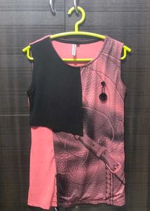 pink and black sleeveless top