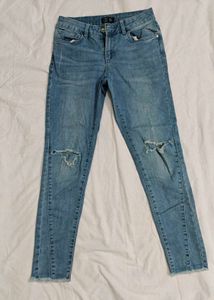 Dnmx Ripped Jeans For Women