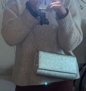 Sparkling Silver Clutch cum sling with chain👛
