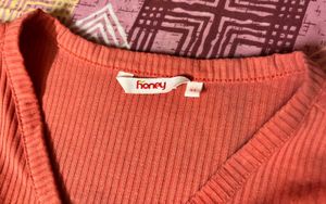 Coral Ribbed Knit Button-Up Top