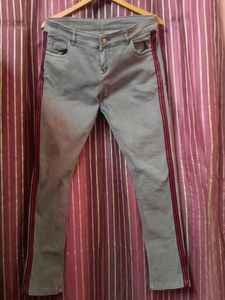 Grey Jeans with Red Stripe