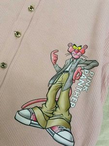 A beautiful peach coloured crop shirt