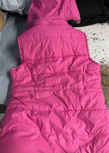 Brand new pink sleeveless jacket with hoodie