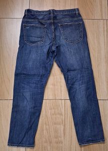 Distressed Blue Denim Jeans