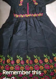 embroidered gown