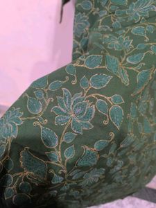 Green floral print kurti with golden detailing