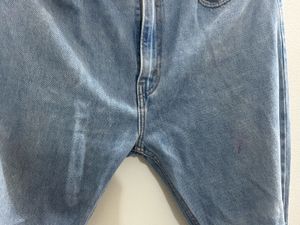 Ripped Knee Jeans