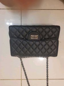 black bag with grey chain
