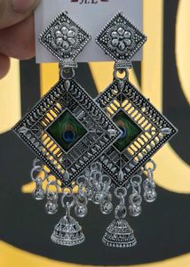 mobile stand, Ice roller, 1peacock Earring, 1set