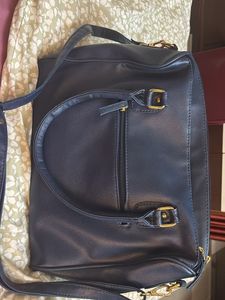 Yelloe V Shaped Zip Blue Hand Held Bag
