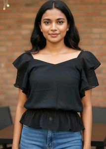 The perfect black top, elevated.