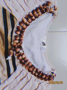 Beaded neckline &amp; flowy bottom