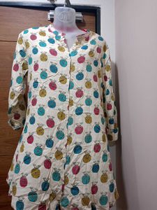 (Max) Cream Base With Pink,Teal,Mustard, And Blue.