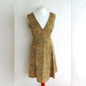 H&amp;M yellow and Black animal print skater dress.
