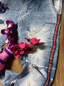 Ripped Jeans with Striped Detail