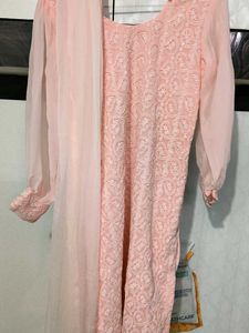This pink colored georgette Plazo Suit