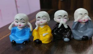 Pack Of 4 Monk Showpiece