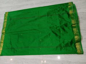 Elegant Green Saree with Golden Border