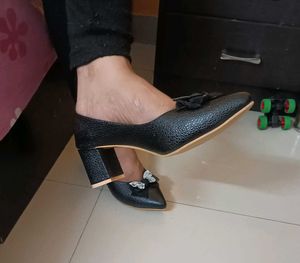 Black Heels with Bow Detail