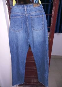 Ripped Blue Denim Jeans