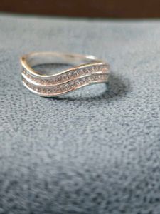 Pure silver ring in white zircon.