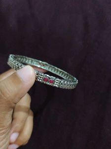 Stylish Silver Bangle with Stone Accents