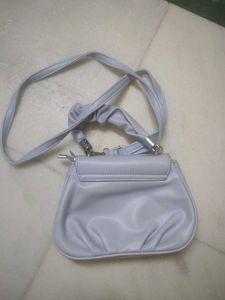 A Cute , Stylish Light Pastle Blue Sling Bag