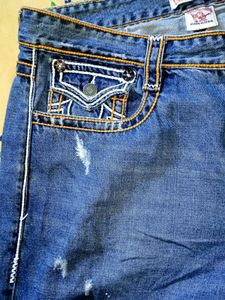 Distressed Denim Jeans