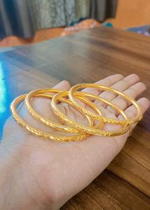 Set of Four Gold Bangles