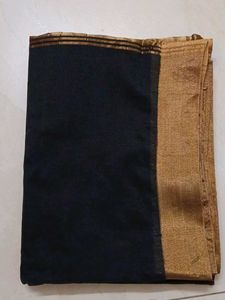 Black saree with golden sare
