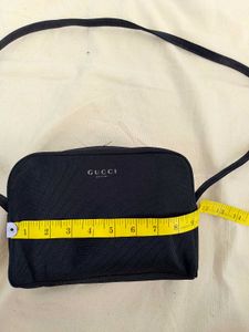 Gucci sling (perfume bag)