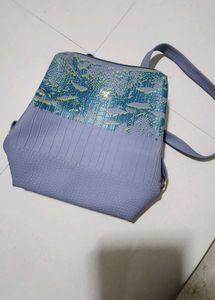 Baggit Textured Blue Backpack Bag