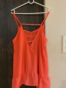 Coral Tank Top with Ruffle Detail