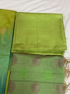 Green banarasi zari suit.