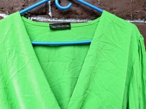 Bright green crop top.