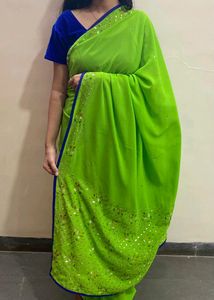 GREEN SAREE WITH BLUE BLOUSE