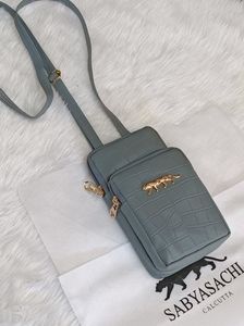 Mobile sling with two zips
