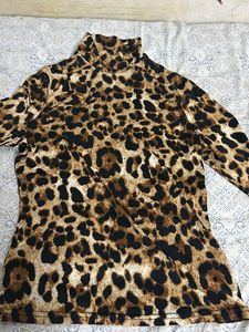 A Leopard Print Turtle Neck Fitted Top