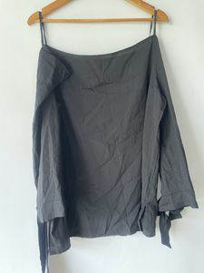 it is new and side cut off shoulder