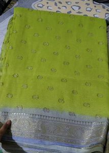 Stylish shimmery Green Saree for everyone