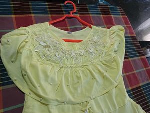 Yellow Dress With Peral Design