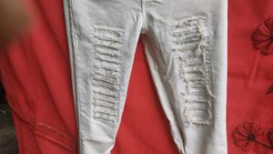 Ripped White High-Waisted Jeans