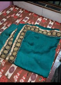 Elegant Green Saree with Gold Border