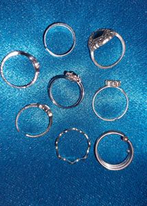 Assorted Gold Tone Earrings and Silver Rings