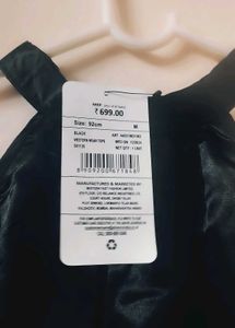 She in Elegant Black Halter Top