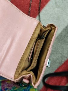 lino Perros pink sling bag