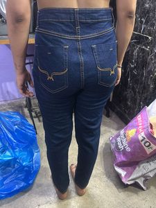 Ripped Knee Jeans