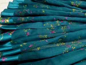Graceful Teal Green Saree with Floral Design