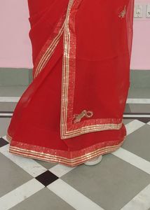 bright red saree with blouse